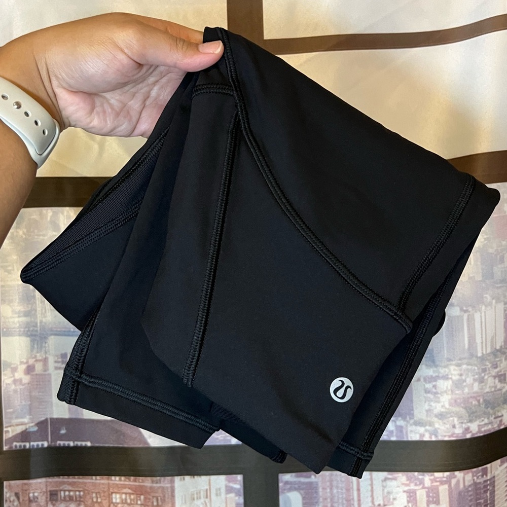 Lululemon Black Leggings with Sheer Mesh Panels Size 4 Excellent Condition